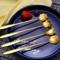 Fako Bijoux® - 8 Lange Lepels Bloem Motief - Latte Macchiato - Longdrink - Cocktail - Dessert - IJs - Koffie - Goud - 8 Stuks - Bewaarzakje -Bestek Verkoop 1200x1200 1017